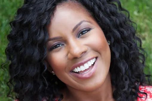 Close-up of bright white smile after professional teeth whitening at Roam Dental