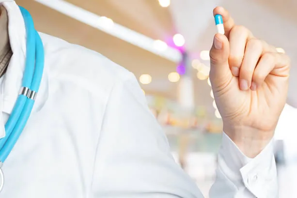 Dental professional preparing sedation medication