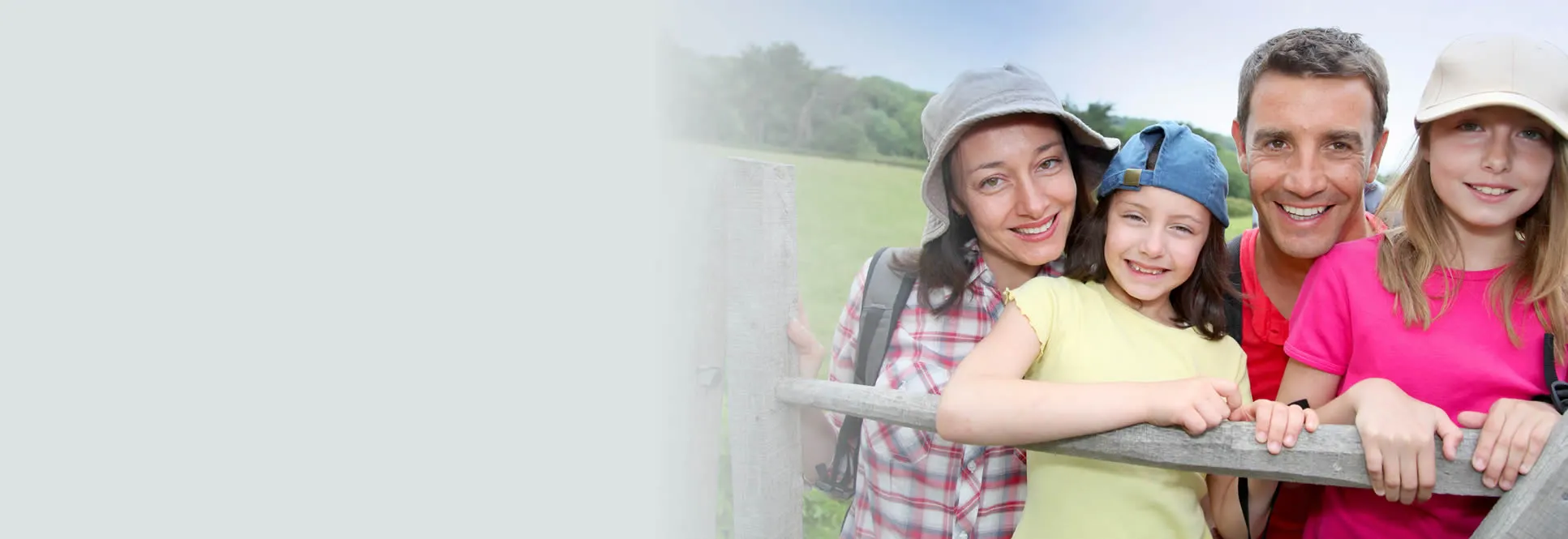 Family with healthy smiles from general dentistry care at Roam Dental