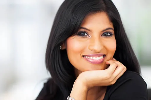 Woman with beautiful smile after cosmetic bonding